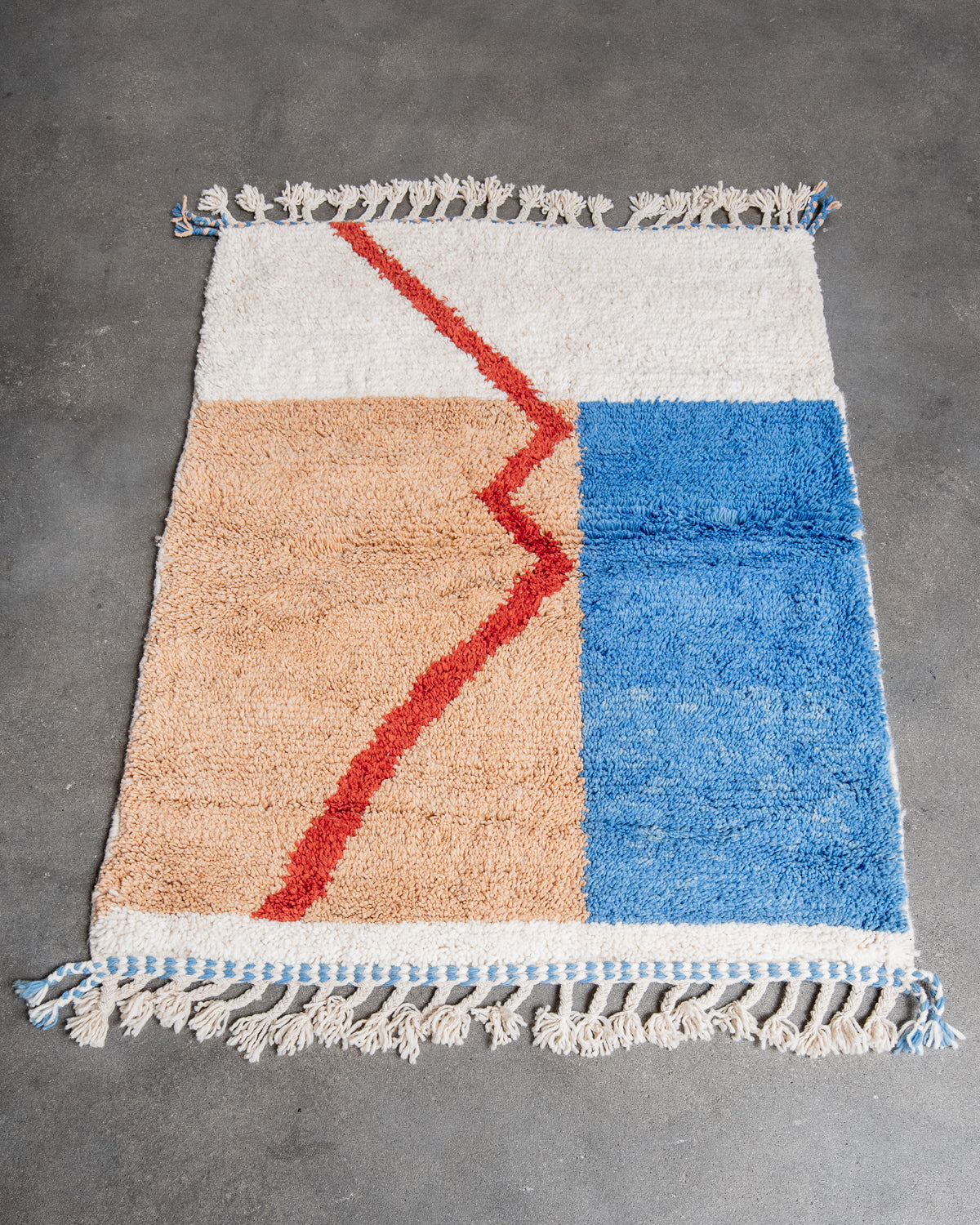 Modern, designer, handcrafted Berber rug from Morocco. Beniourain carpet with beautiful colours and patterns and fluffy wool texture.